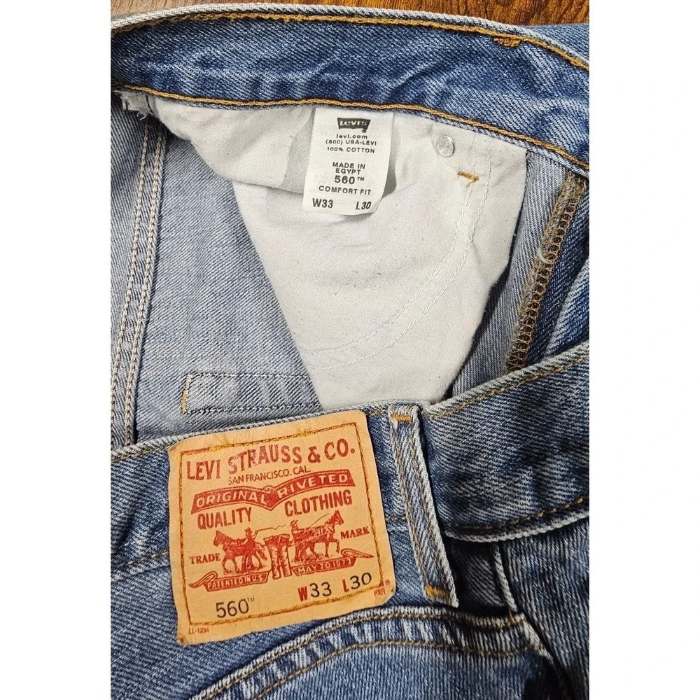 VTG Y2K 560 Loose Comfort Fit Tapered Leg Jeans Men's‎ 33x30 Light Wash